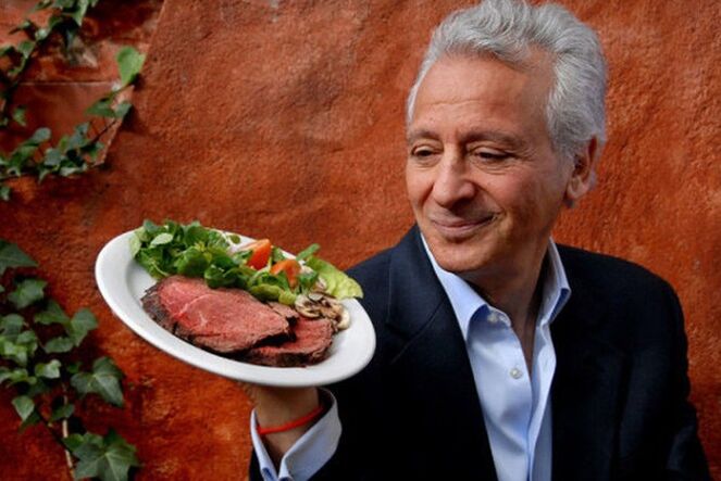 Pierre Ducan with a dish of meat and vegetables